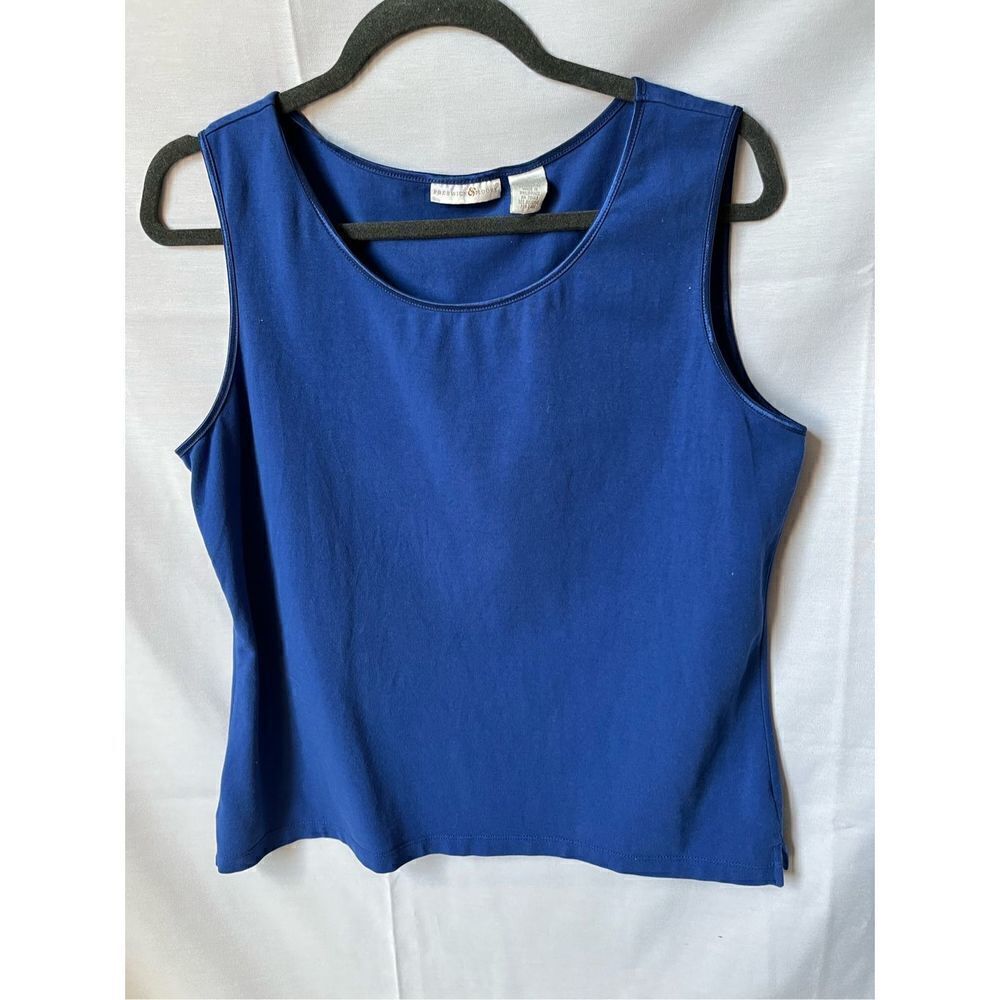 Preswick & Moore Cobalt Blue Top With piping around collar and arms .